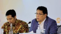 Ketua Dewan Komisioner LPS Purbaya Yudhi Sadewa (kanan)