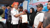 acara penyerahan Sertifikat Hak Milik (SHM) bagi warga transmigrasi di Desa Kancu’u, Kecamatan Pamona Timur, Kabupaten Poso, Jumat (19/11/2025).