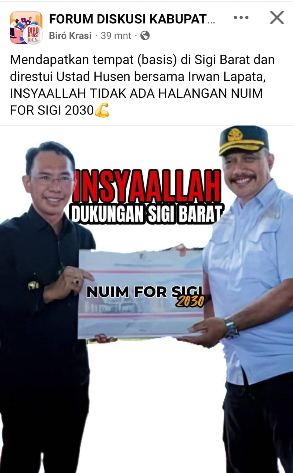 postingan sendiri, tanpak foto Irwan Lapatta memegang (plakat-red) bersama Sekda Sigi Nuim.