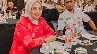 Ketua KPU Sulteng, Darmiati, didampingi Sekretaris Taufik Ismail, saat mengikuti Rakornas di Magelang. FOTO: IST
